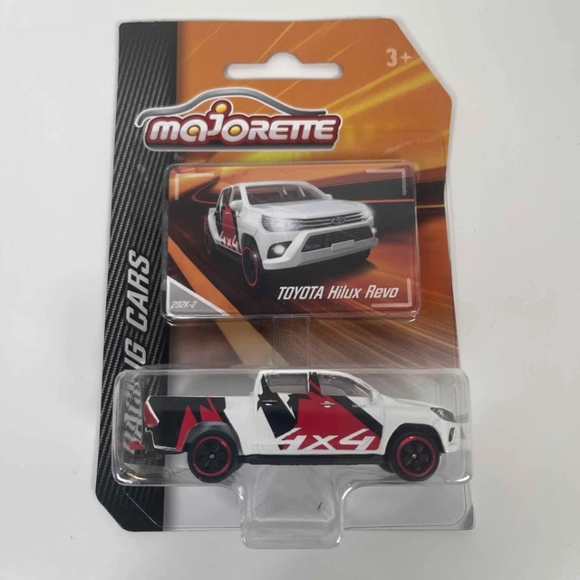 Majorette Ride Wild Racing Set 1:64 – 2 Auto In Metallo + Rimorchio, 4 Modelli Casuali (Ford, Porsche, Nissan, Land Rover)