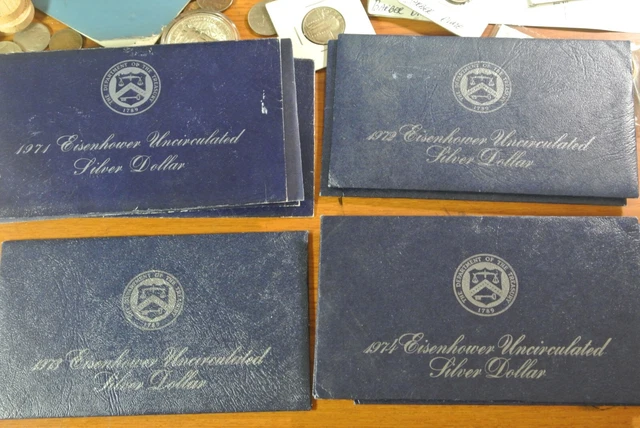 Ten (10) Assorted Ike Eisenhower 40% Unc Silver Dollars - Blue Envelopes -