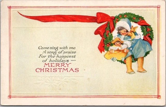 Vintage MERRY CHRISTMAS Embossed Postcard Little Girl with Doll c1910s