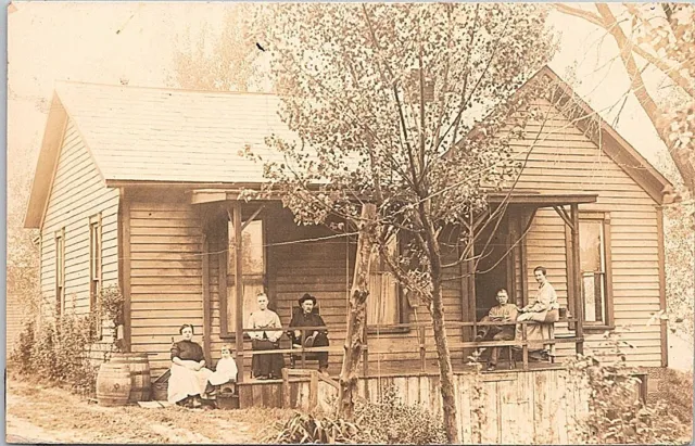 RPPC Family on the Front Porch Newcomerstown Ohio early 1900s
