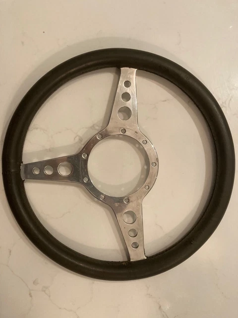 Moto lite steering wheel. Aluminium frame and black leather rim. Rim 13ins,33cm.