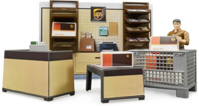 BRUDER BRUDER 1:16 ACCESSORI SET CENTRO SPEDIZIONI UPS CON FIGURA E ACCESSORI ART 62250 
