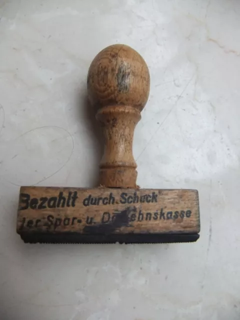 Alter Büro-Stempel Bezahlt durch Scheck der Spar- und Darlehnskass, Holzstempel