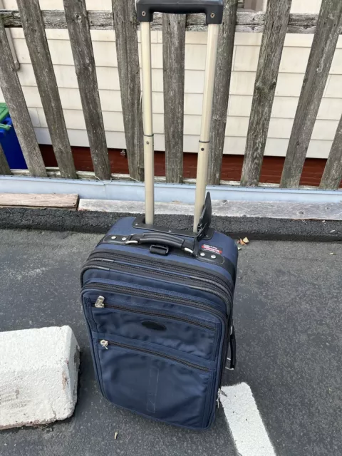 Kirkland Signature 22” Expandable Wheeled CarryOn ballistic nylon Suitcase Blue