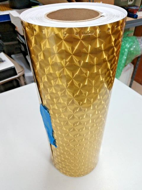 VinylEfx Lg. Engine Turn Gold Vinyl 5yr 15"x50yd punched Gerber Edge damaged