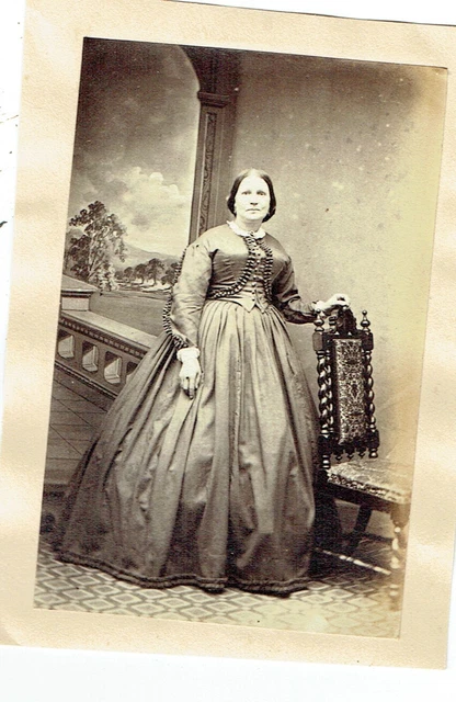 Victorian cdv type photo woman standing long dress with jacket holding chair