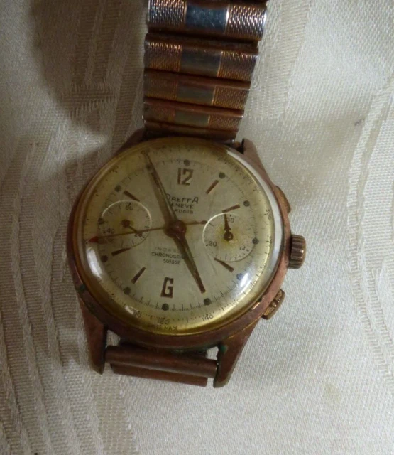 MONTRE SUISSE ANCIENNE mécanique homme CANDINO plOR date AS 1951