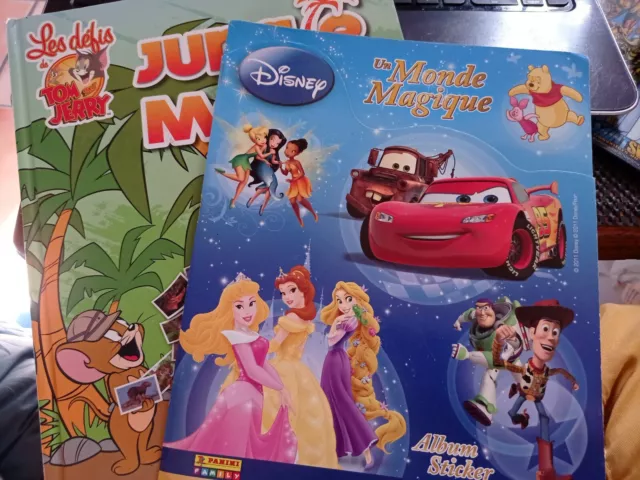 Album Auchan Jungle Mania + Panini Un Monde Magique Disney