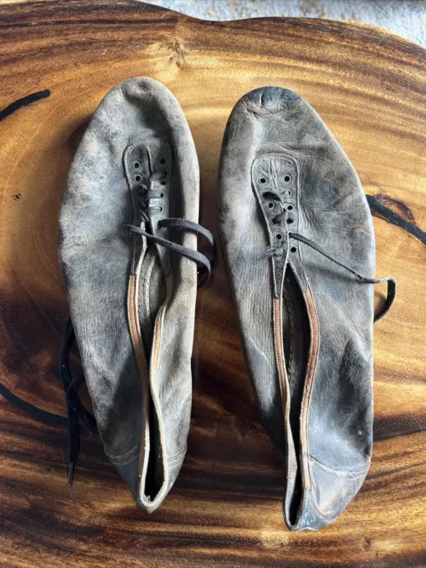 Antique track shoes by Law Of London