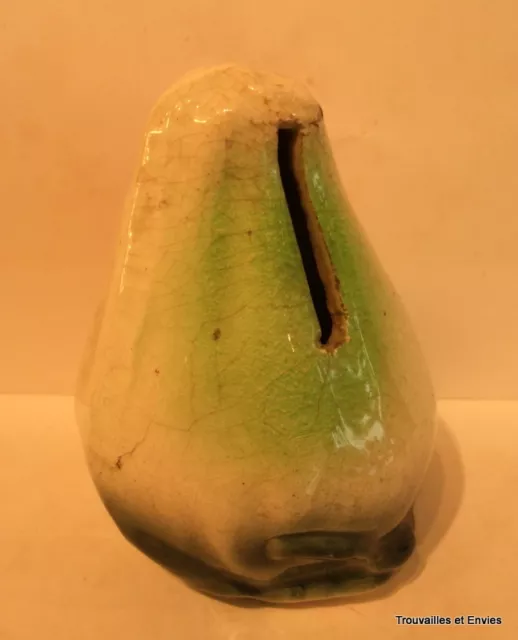 Tirelire en barbotine, forme de poire, hauteur 11,5cm