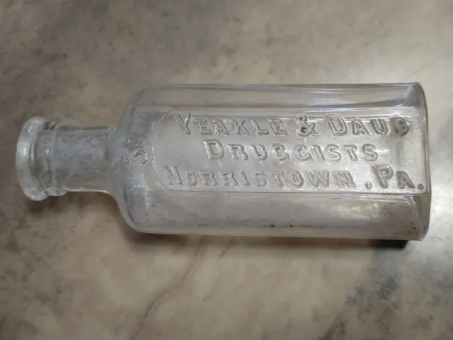 Antique Embossed Glass  3.75" Bottle Yeakle & Daub Druggists Store Norristown Pa