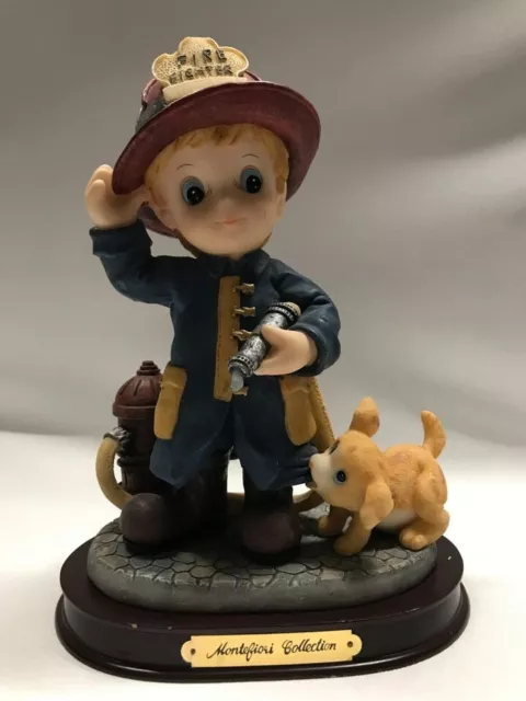 Montefiori Collection Little Firefighter with Puppy Dog