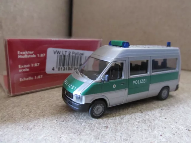 VW LT  Polizei Spiegel geklebt, rechts angebrochen  mit OVP  1:87 Herpa 045636