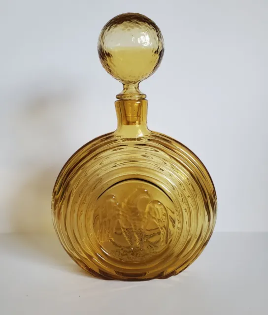 Vintage Empoli Rossini Embossed Eagle Concentric Ring Eagle Amber Flask bottle