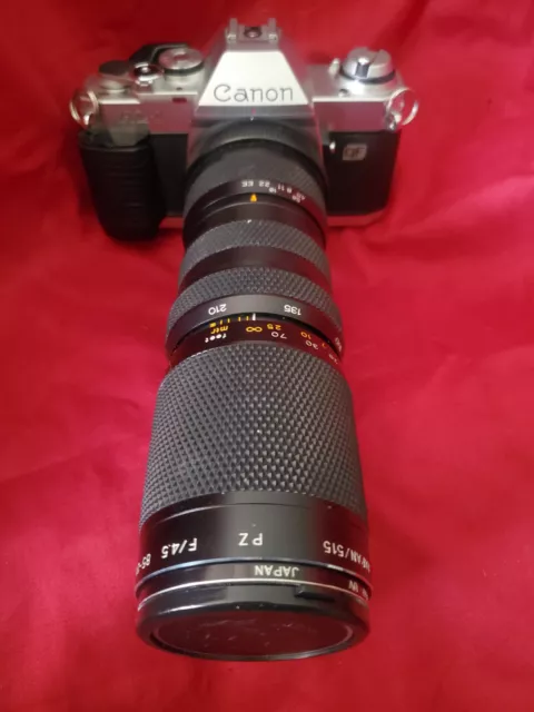 Canon A-1   w/85-210 Zoom f4.5 Lens,  55mm UV filter & cap
