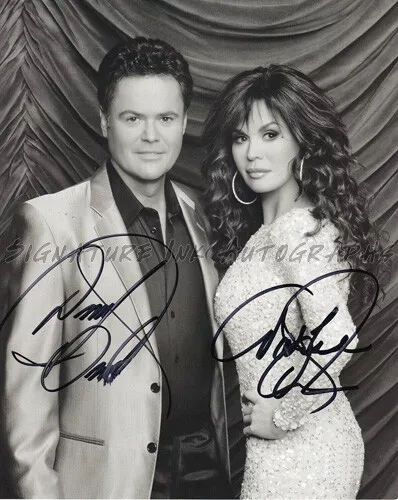 DONNY & MARIE OSMOND AUTOGRAPHED-SIGNED 8x10 PHOTO reprint