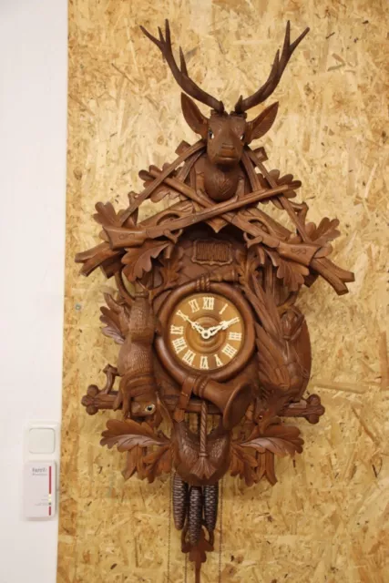 Enorme reloj de cuco madera tallada 83x50cm con juego Regula