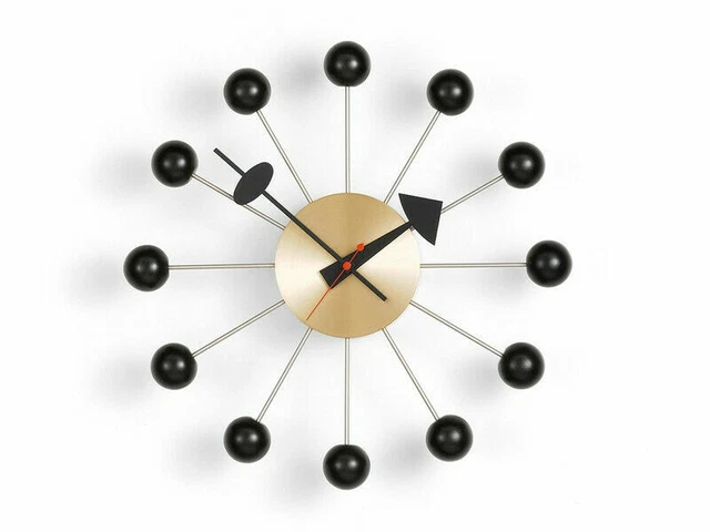 Grande horloge murale boule Vitra des années 1950 en métal noir et laiton...