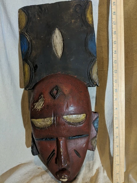 Vibrant Burgundy Mask with Great Carved Details — Authentic African Wood Art