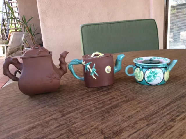 lot of 3 Chinese yixing tea pots, two with enamels, Republic period