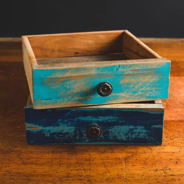 Old Dovetail Drawers + Old Tin Knobs + New Turquoise Paint = GREAT DISPLAY