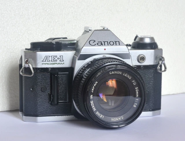Appareil photo Canon AE-1 program + objectif FD 50mm 1:1.8 : FONCTIONNE + Accesso