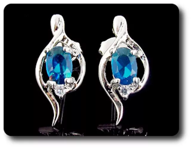 BOUCLES D'OREILLE SAPHIR BLEU 2x7 mm Plaqué Or blanc 18 K.