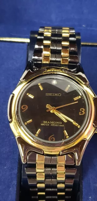 Mens Seiko Japan Diamond Water Resistant Gun Metal Gold Tone Quartz Watch 069790