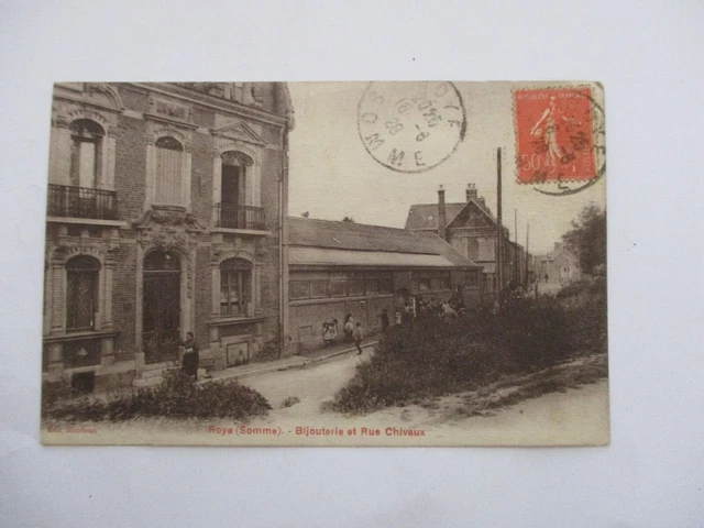 Cpa Dos Vert Somme 80 Roye Bijouterie Et Rue Chivaux