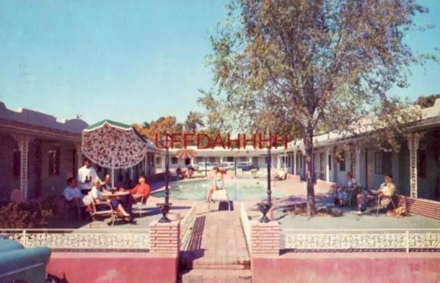 1957 PARK PLAZA MOTEL U.S. Route 66 ST. LOUIS, MO. guests enjoy the pool