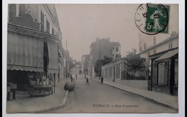 cpa-92-PUTEAUX-Rue Pincevins-voyagé,tbe.
