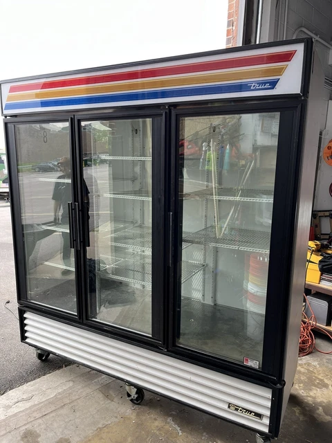 true Triple Swing Glass Door Merchandiser Refrigerator