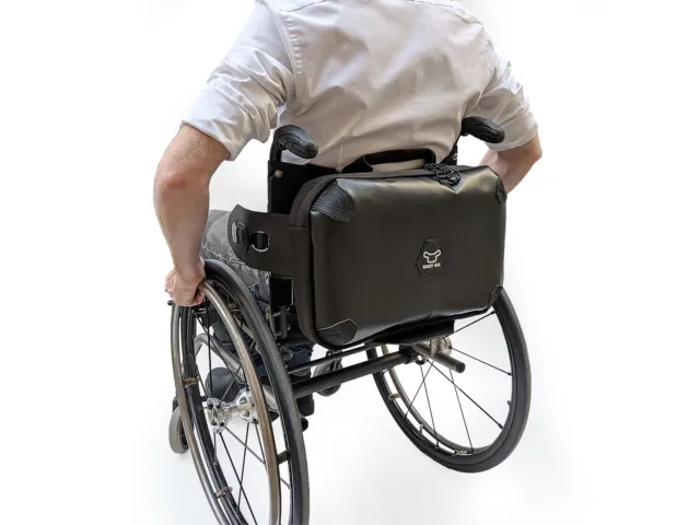 Práctica bolsa negra dinámica con ranura para computadora portátil para sillas de ruedas manuales