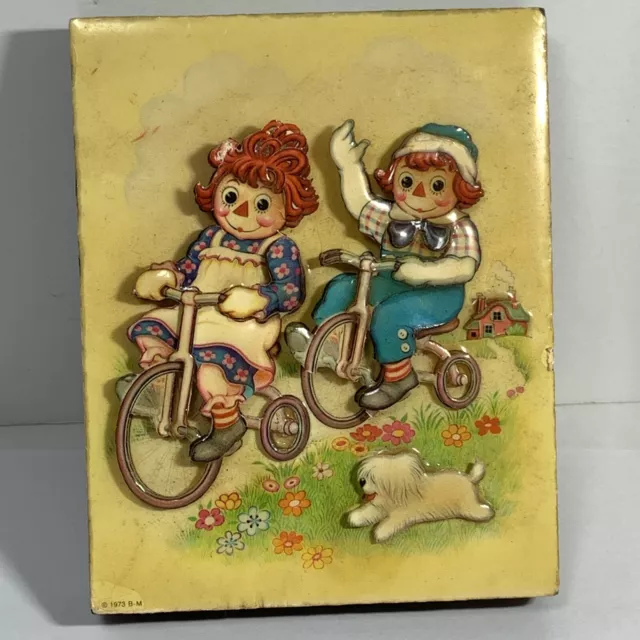 VTG Raggedy Ann Andy 1973 BM Wall Plaque 3-D Paper Cut RIDING BIKES DOG Wood 5"