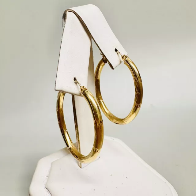 Vintage 14k Yellow Gold Diamond-Cut Pierced Oval Hoop Earrings