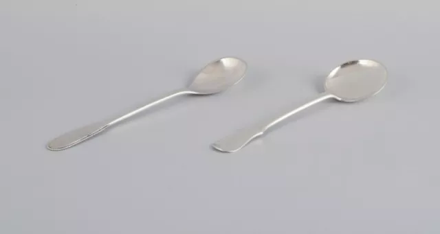 Evald Nielsen, Danish silversmith. Two hammered sugar spoons. Danish 830 silver