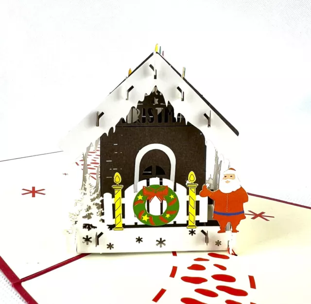 BC Worldwide Ltd hecha a mano 3D emergente tarjeta de Navidad Santa Claus caramelo casa blanco