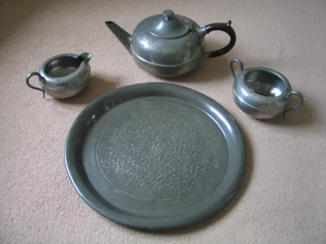 Knighthood Old English pewter tea set: tray, teapot, sugar bowl, milk jug.