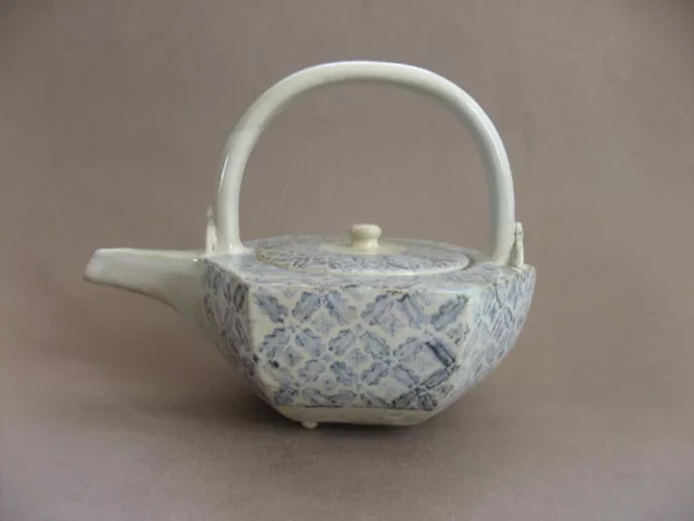AN EARLY 18TH C. Japanese Arita porcelain wine ewer , stamped brocade ...