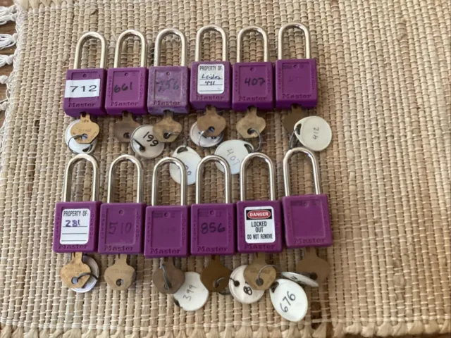 Lot of 12 Master Lock purple Safety Lockouts w/ Keys - Working!