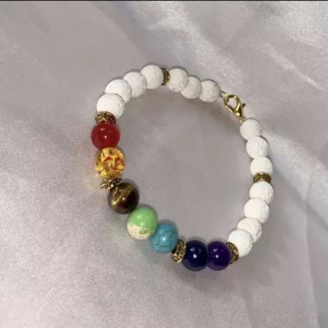 Chakra With White Lava Beads Gold Spacers Bracelet