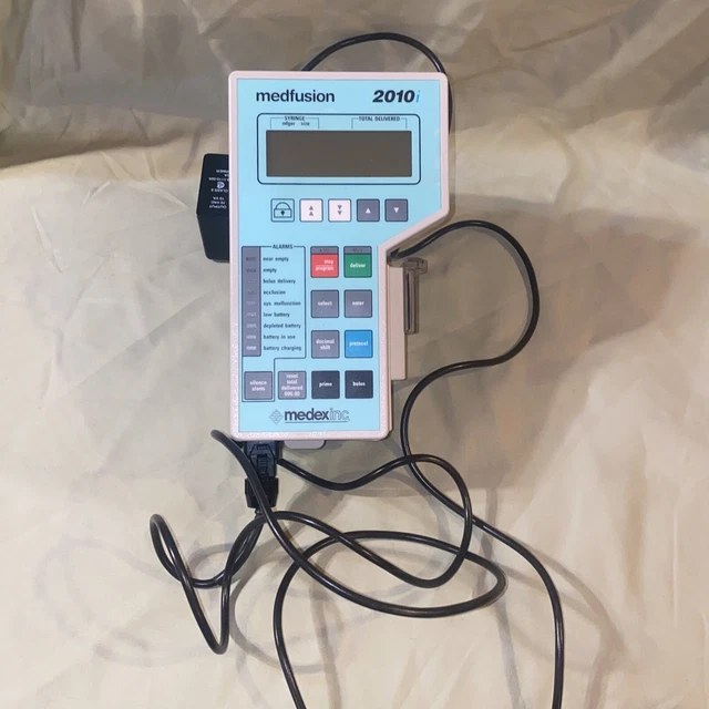 Medfusion 2010i Pump with Pole Clamp & Power Supply. AS IS Please read