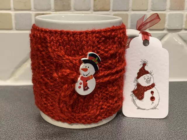 Hand Knitted Red Sparkle Christmas Mug Cosy With Cute Snowman Button