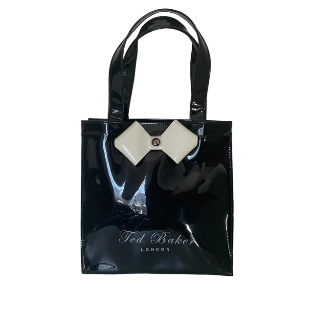 Alexiis faceted bow sales leather tote bag