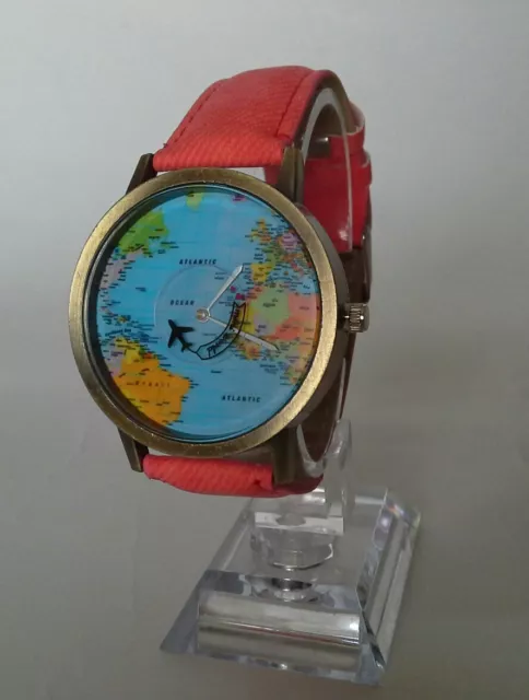 Montre avion face à la carte du monde 2ème main avec bracelet rose - boîtier de 40 mm