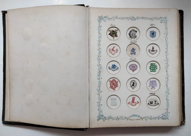 A late Victorian and early Edwardian collection of crests and monograms in album