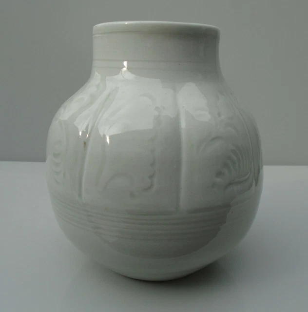 Korean white glazed lobed vase with incised decoration