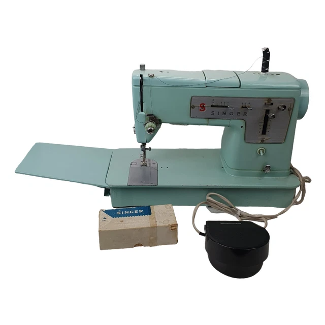 vintage singer sewing machine 338 in blue accessories and case made in england