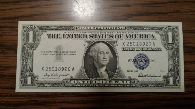 FR-1619  $1 1957 Silver Certificate 1 of 2 Uncirculated Blue Seal.