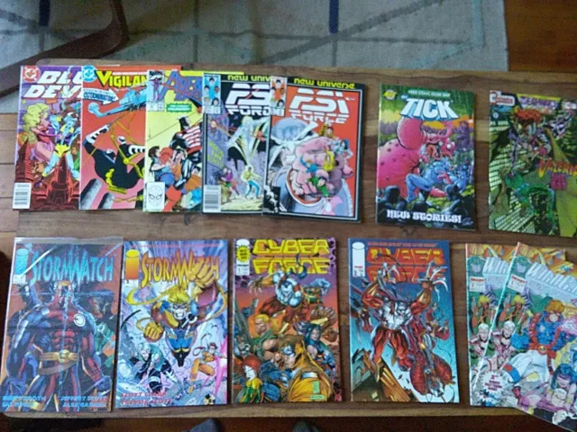 Large lot 13 comic books circa 1993 DMC Stormwatch Marvel Wildcats Cyber Force